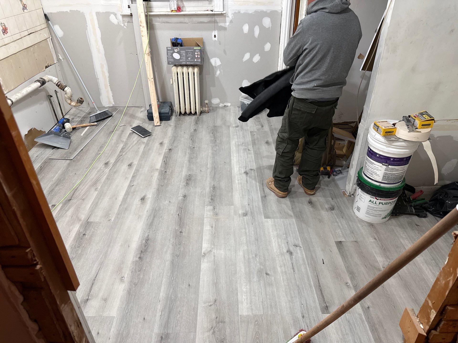 Crew installing new flooring