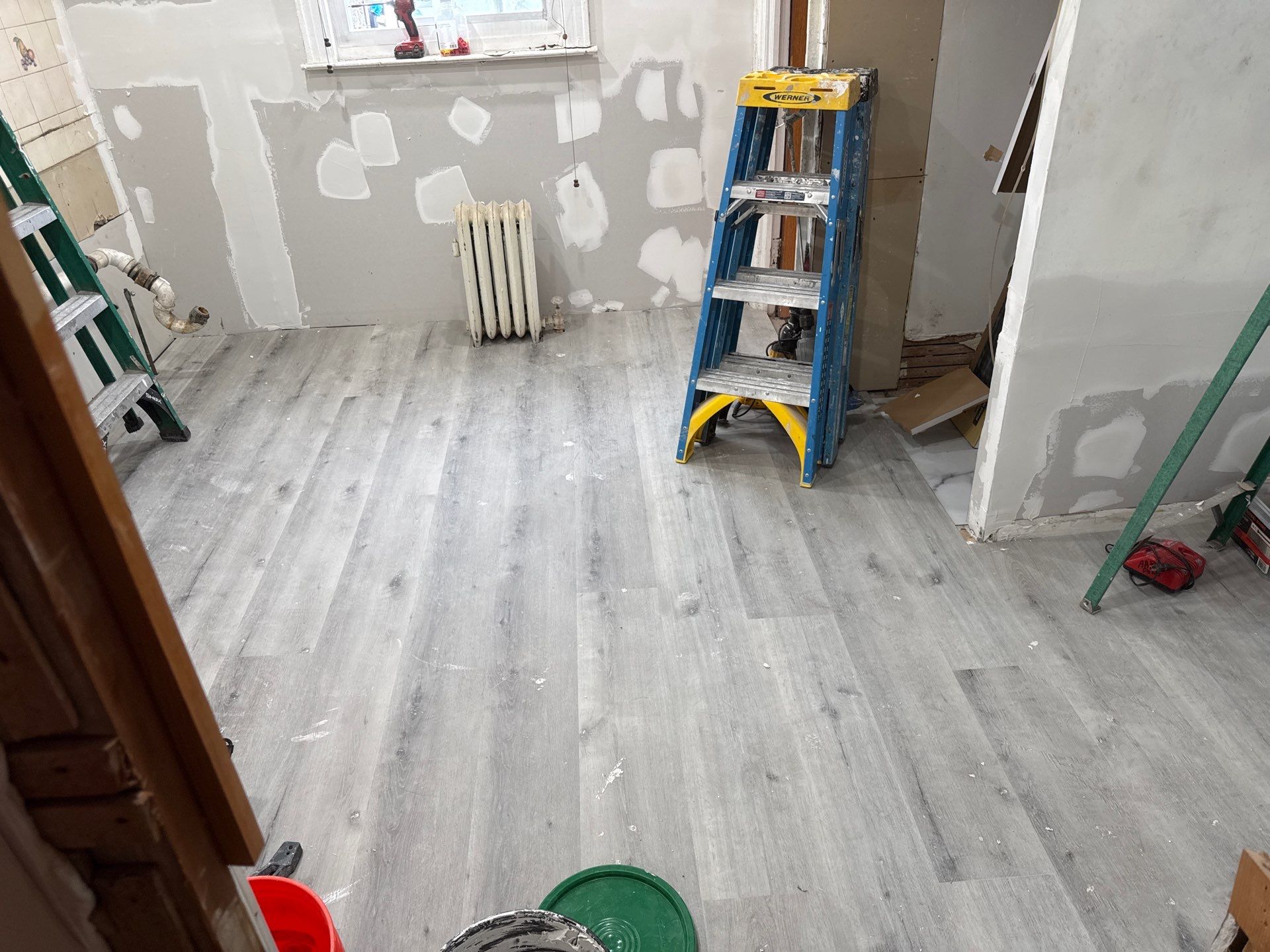 Patched drywall and new flooring