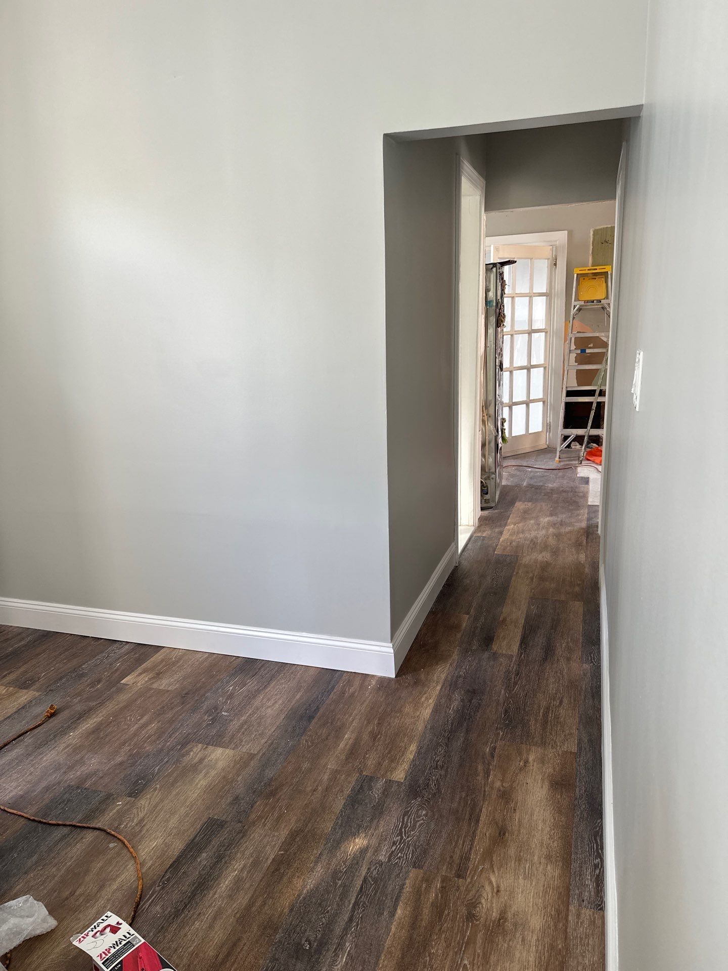 Finished hallway with fresh paint and new floors